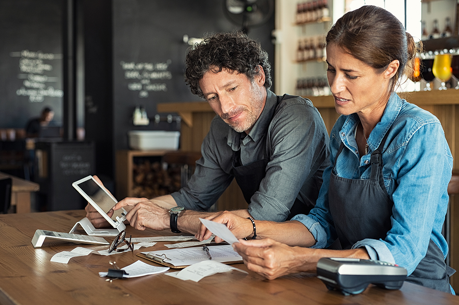 Woman and man reviewing business tasks